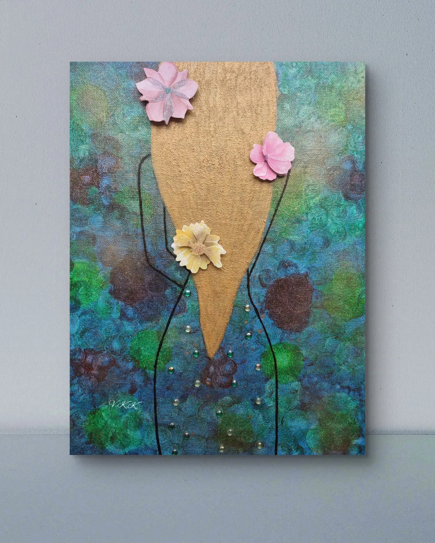 Abstract painting with a gold teardrop shape, blue-green background, and three pink and yellow flower embellishments.